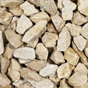 Grote brokken Yellow Sun breuksteen 15-30 cm in een 500 kg Big Bag voor decoratieve rotstuinen en schanskorven.